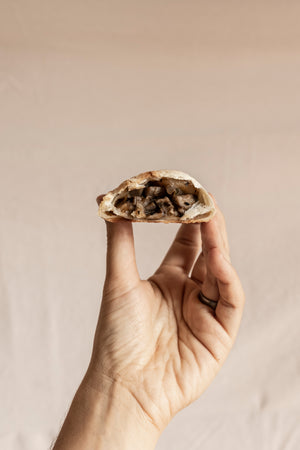 
                  
                    VEGAN MUSHROOM EMPANADA
                  
                